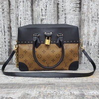 Louis Vuitton City Malle Reverse Logo