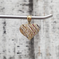 14K Fancy Cut Heart Pendant