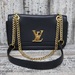 Louis Vuitton Calfskin Lockme Chain Bag