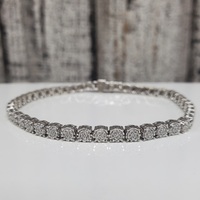 8.25" 10k Diamond Cluster Illusion Set Bracelet 