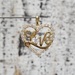 10K "Love" Heart Shaped CZ Pendant